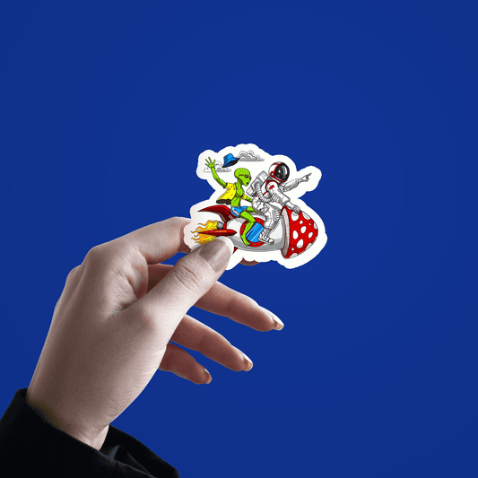 Alien with Astronaut on Spaceship Sticker - sticckiz.com
