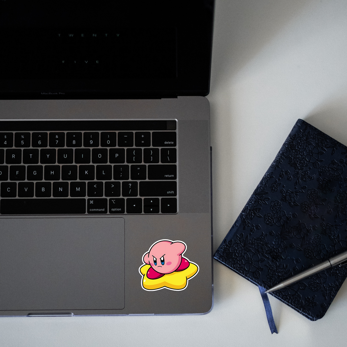 Angry Kirby Sticker laptop mockup