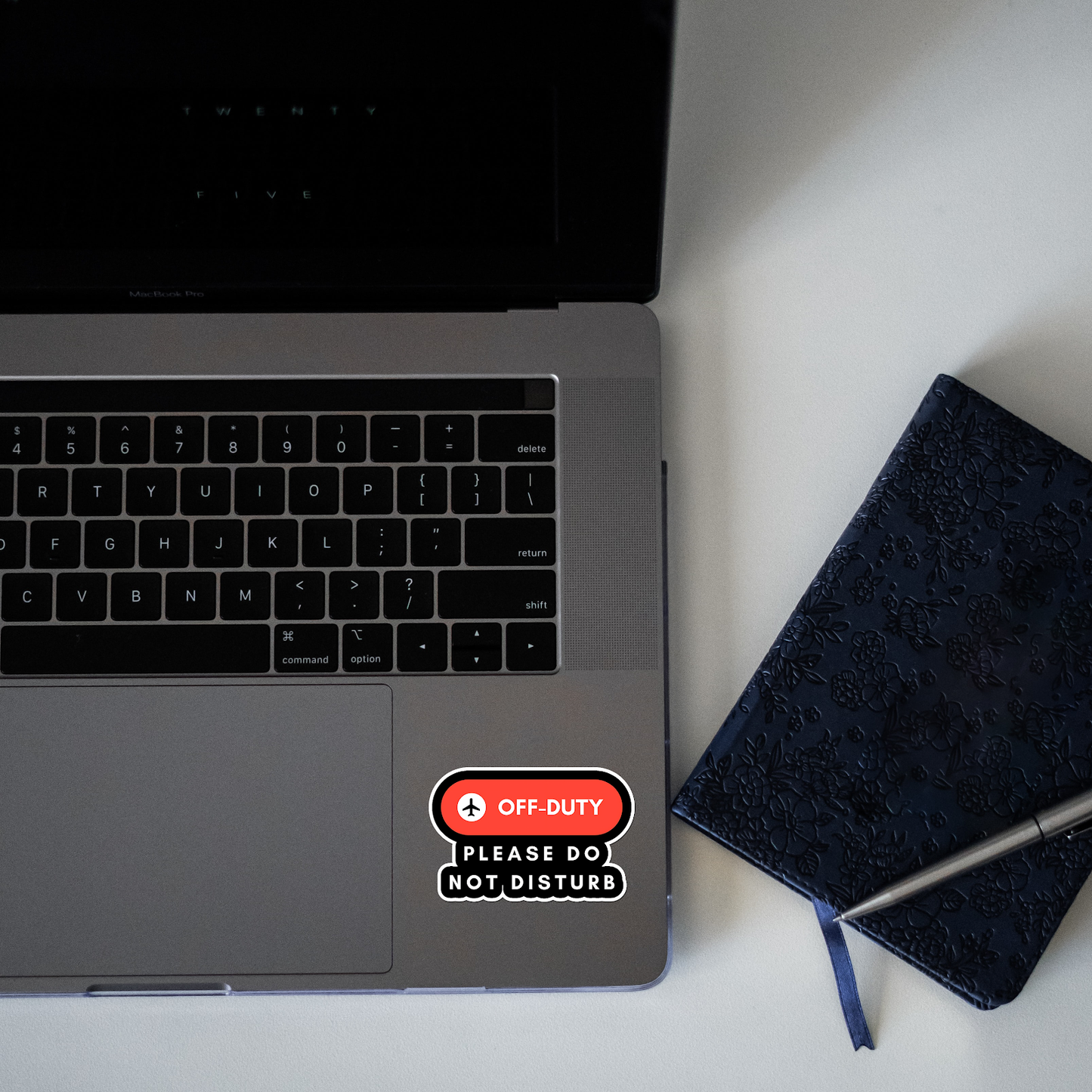 Off Duty Sticker laptop mockup