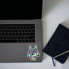 Gaming Remote In Hand Holographic Sticker - sticckiz.com