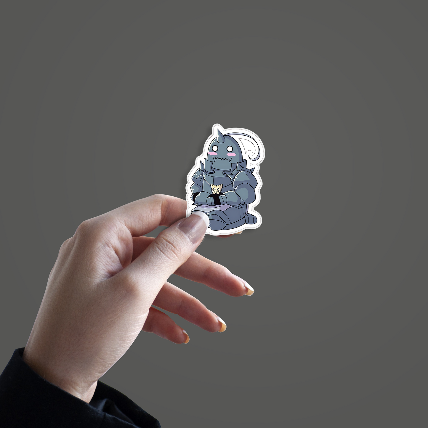 Chibi-style Alphonse Elric from Fullmetal Alchemist holding a small cat Sticker