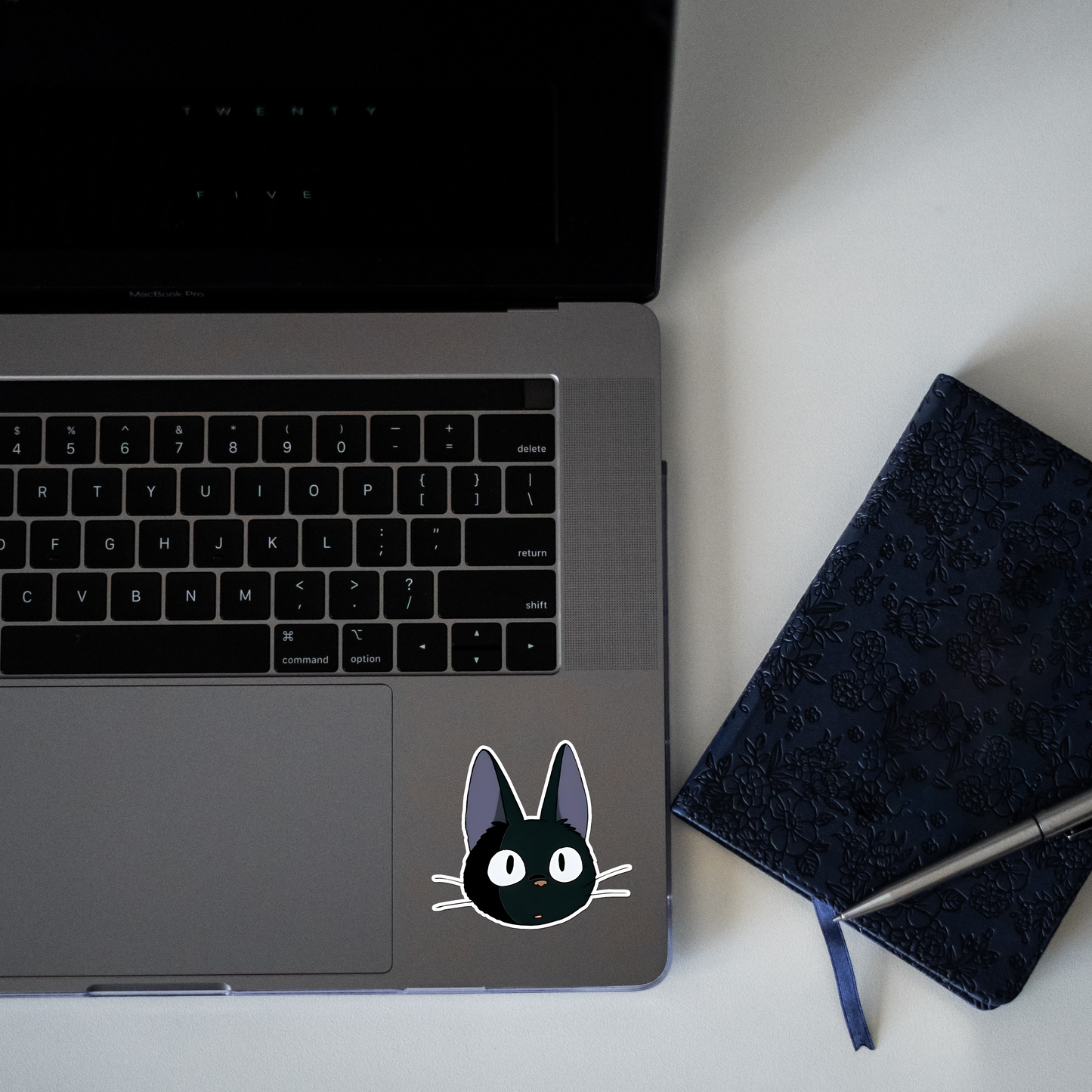 Jiji, the iconic black cat from the Studio Ghibli film Sticker