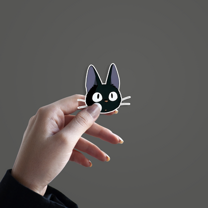 Jiji, the iconic black cat from the Studio Ghibli film Sticker